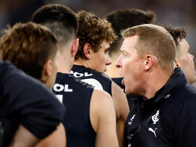 Michael Voss addresses his troops on Saturday night. Picture: Michael Willson/AFL Photos via Getty Images.