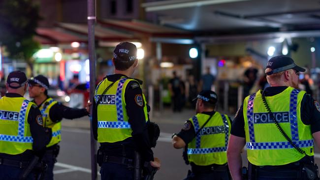 Police on Mitchell St, in the Darwin CBD. Picture: Che Chorley