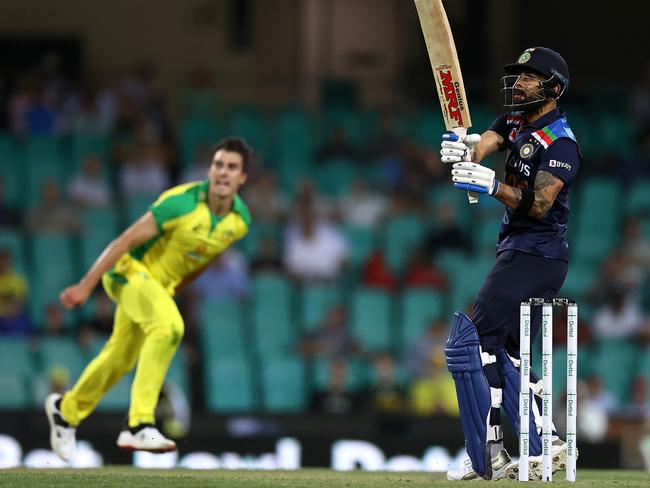 Virat Kohli of India plays a shot off Pat Cummins during game two of the One Day International series between Australia and India at Sydney Cricket Ground. Picture: Ryan Pierse