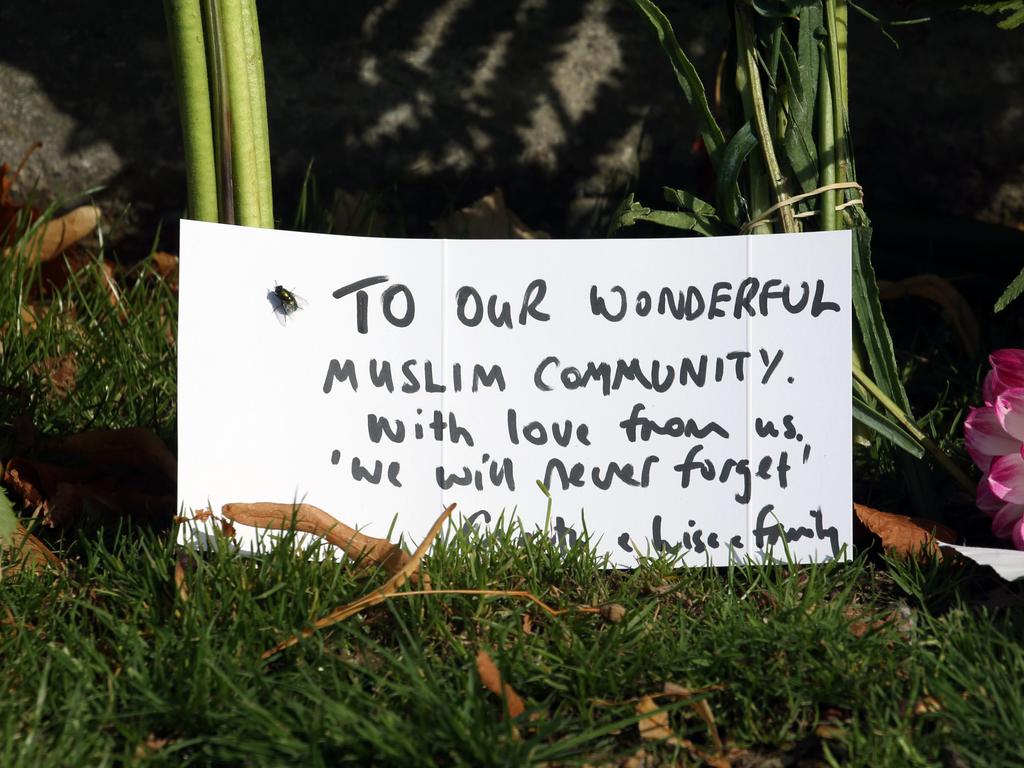 People have been placing flowers and messages at a local park. Picture: Gary Ramage