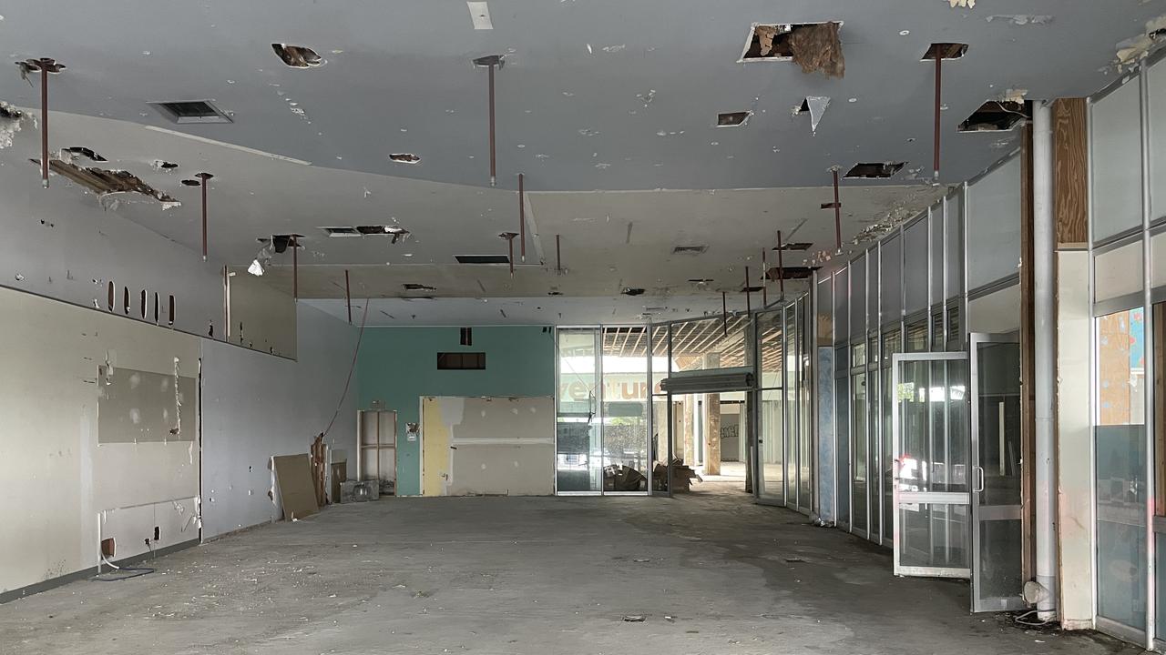 Peering through a window revealed the crumbling interior inside the former Dimmeys Arcade. Picture: Leighton Smith.