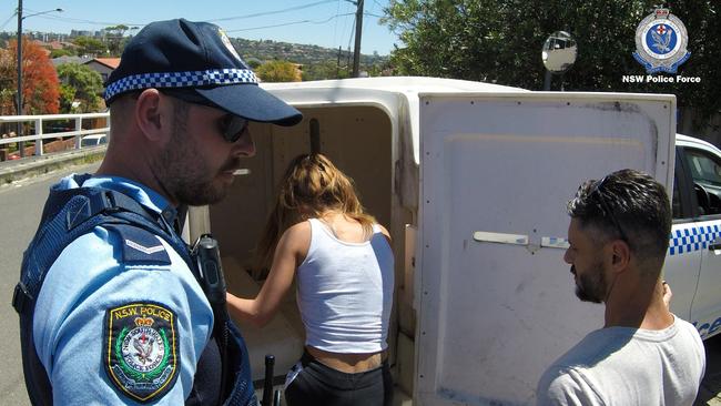 Danielle Hogan gets into a police wagon. Picture: NSW Police