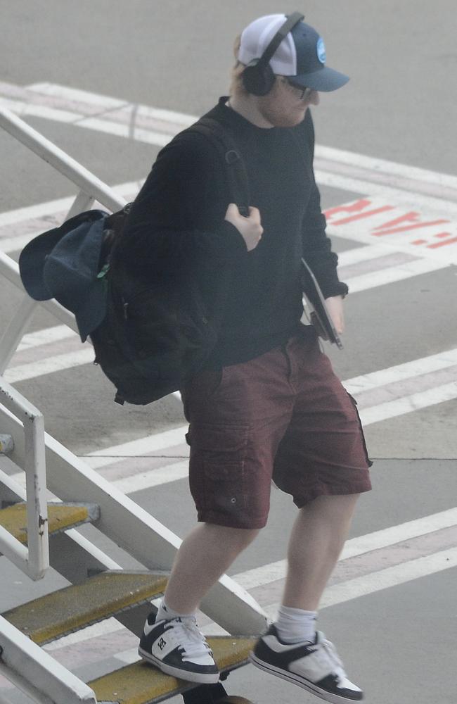 Ed Sheeran touching down in Sydney yesterday. Picture: MEGA