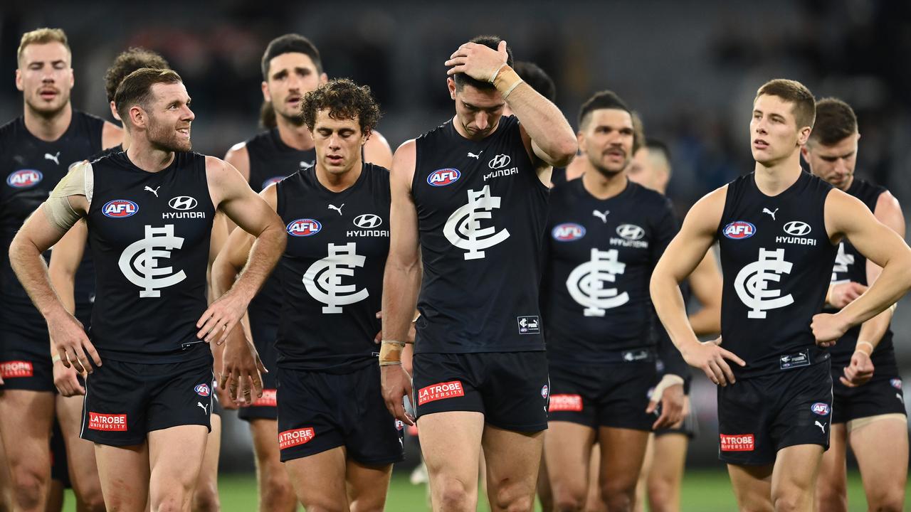 MELBOURNE, AUSTRALIA - APRIL 17: The Blues look dejected after losing the round five AFL match between the Carlton Blues and the Port Adelaide Power at Melbourne Cricket Ground on April 17, 2021 in Melbourne, Australia. (Photo by Quinn Rooney/Getty Images)