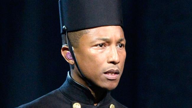 Grammys performance ... Pharrell Williams performs Happy in a bellboy outfit. Picture: Getty