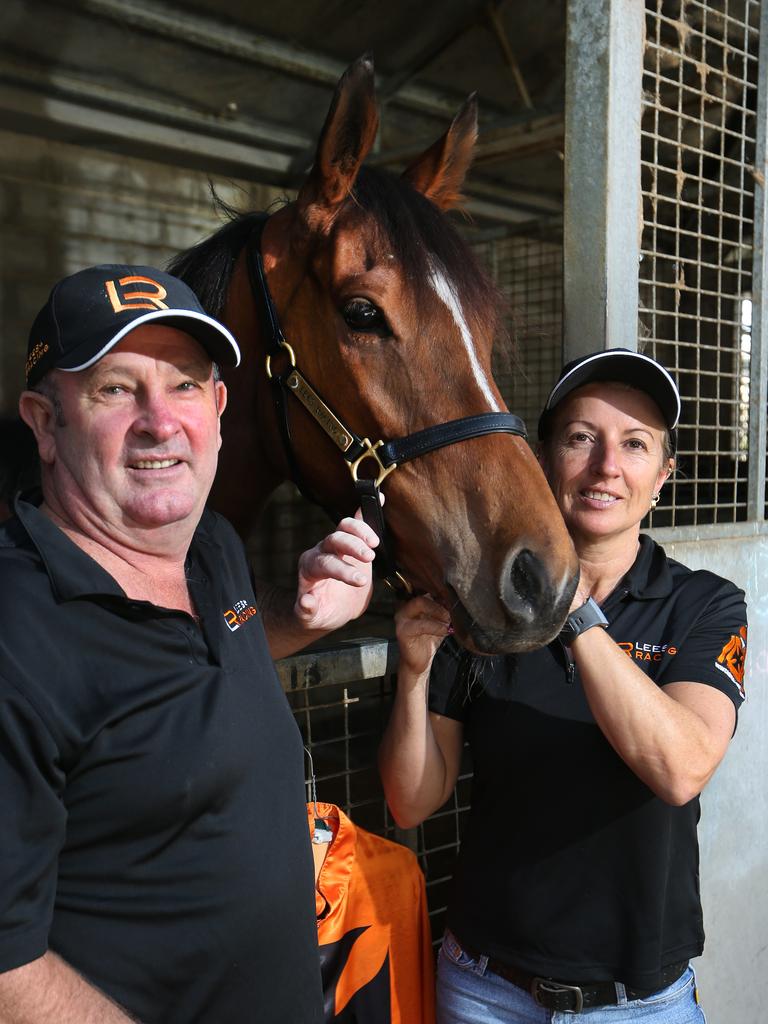 Mel Eggleston and Mandy Jupp with Lees' horse 'Face Like Thunder' at their Bundall stables in 2018. Picture Glenn Hampson