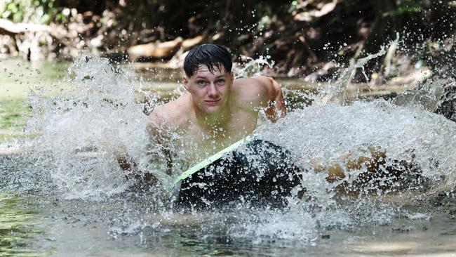 Cairns is currently experiencing hot and sticky weather typical of the start of summer. Smithfield teenager Jake Varcoe finds respite from the warm weather by taking a dip in the cool waters of Freshwater Creek. Picture: Brendan Radke