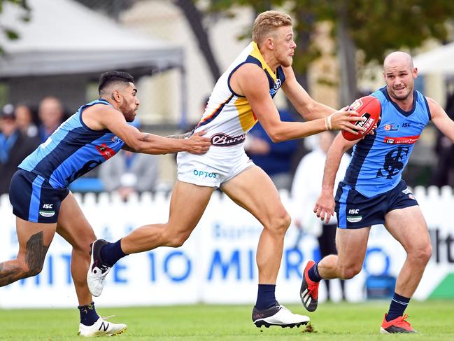 30/03/19 - SANFL: Sturt v Adelaide at Unley Oval.  Adelaide's Hugh Greenwood takes on Sturt's Byron Sumner and Zane Kirkwood. Picture: Tom Huntley