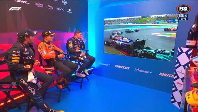 Sergio Perez, Lando Norris and Max Verstappen watch a replay of Daniel Ricciardo's crash.