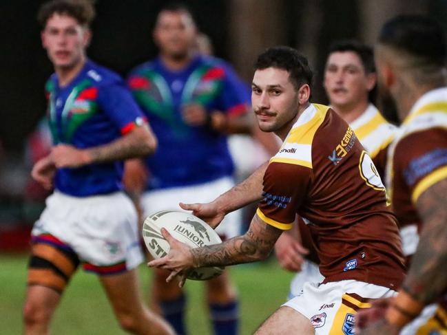 Corey Simpson looks for support. Picture: Warren Gannon Photography
