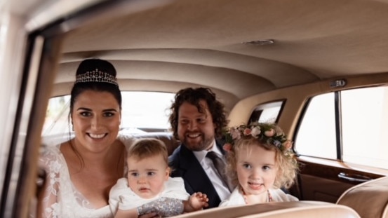 Olivia Catanach and Kyle Wilkinson with Olivia's nieces Lilly and Freya Leonard who were flower girls at her wedding on May 6, 2023. Picture: Tony Evans Photography