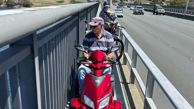 A man on a mobility scooter was forced to reverse for 15 minutes in order to let a cargo bike past on one of the Tasman Bridge pathways due to how narrow they are. Picture: Supplied