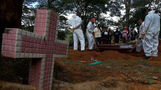 A coffin is buried at the Vila Formosa cemetery in Sao Paulo, Brazil. Picture: AFP