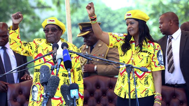 Zimbabwe's president Robert Mugabe said on Wednesday he fired his deputy and longtime ally for scheming to take power, including by consulting witch doctors. Now Mugabe's wife Grace appears poised for the role. Picture: AP.