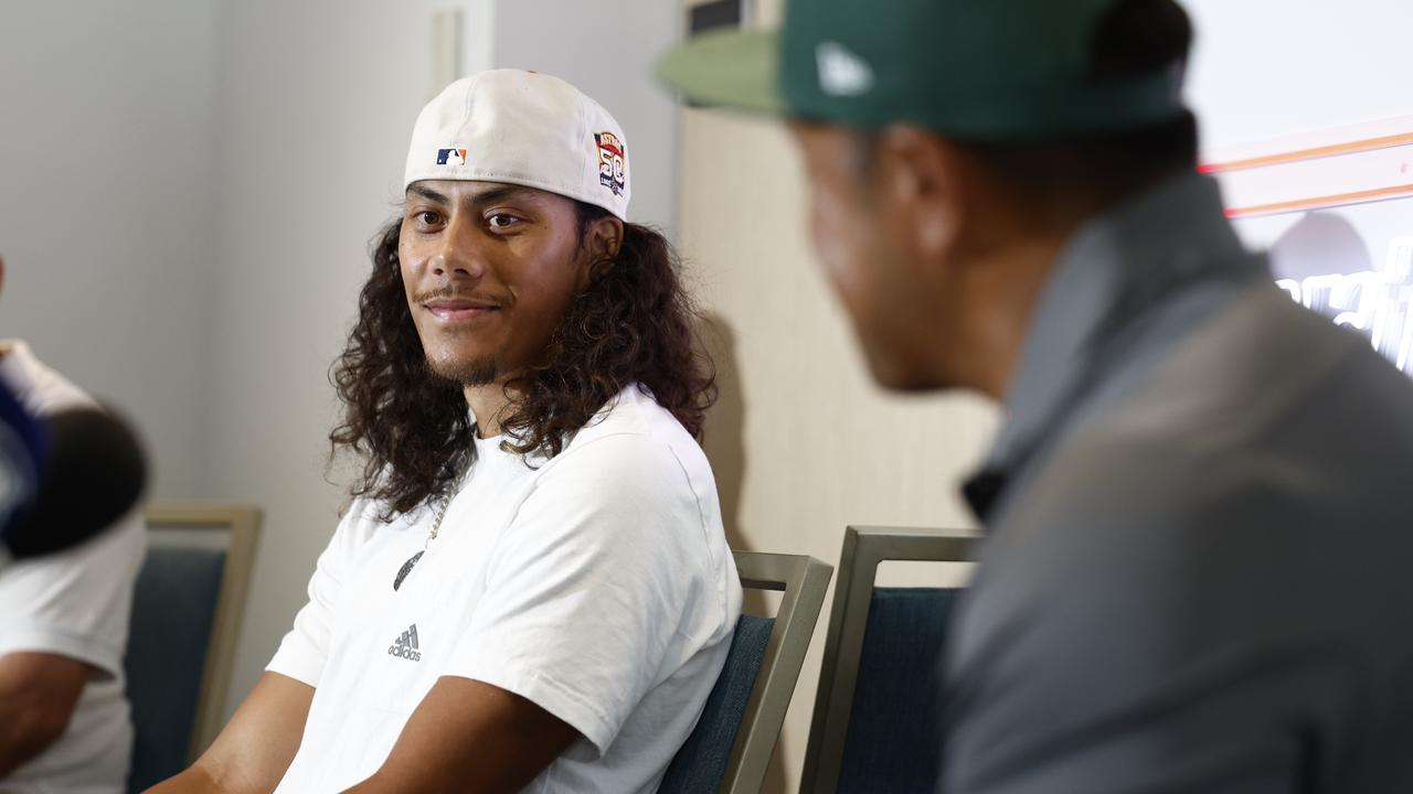 Jarome Luai and his father, Martin, address the media. Picture: Richard Dobson