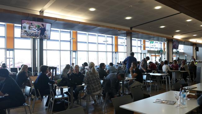 The crowded departure lounge at Hobart Airport. Picture: LUKE BOWDEN