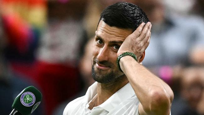 Novak Djokovic teed off at the crowd. (Photo by Ben Stansall / AFP)