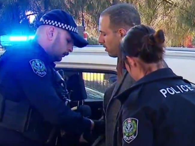 A prominent Adelaide restaurateur is one of two men targeted in a series of callous attacks at North Adelaide. A Man was arrested near the crime scene . Picture: NINE NEWS