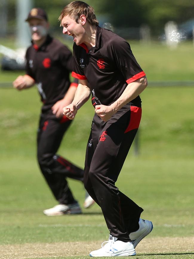 Liam Bowe celebrate a wicket for Essendon. Picture: Hamish Blair