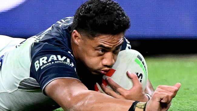 BRISBANE, AUSTRALIA - AUGUST 25: Murray Taulagi of the Cowboys scores a try during the round 26 NRL match between Dolphins and North Queensland Cowboys at Suncorp Stadium on August 25, 2023 in Brisbane, Australia. (Photo by Bradley Kanaris/Getty Images)