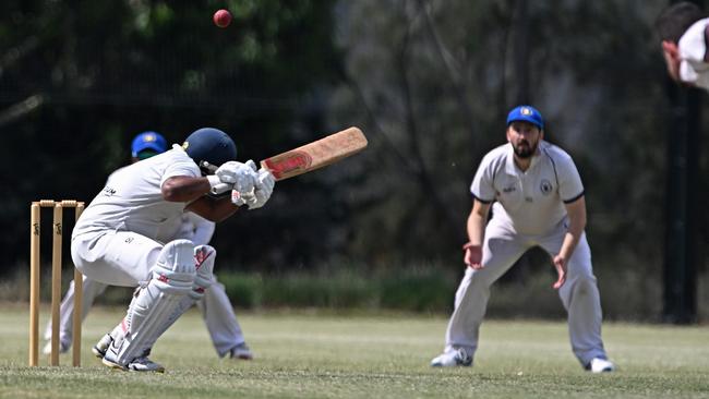 VTCA: Sydenham-Hillside batter Gayashan Weerasekara takes evasive action. Picture: Andy Brownbill