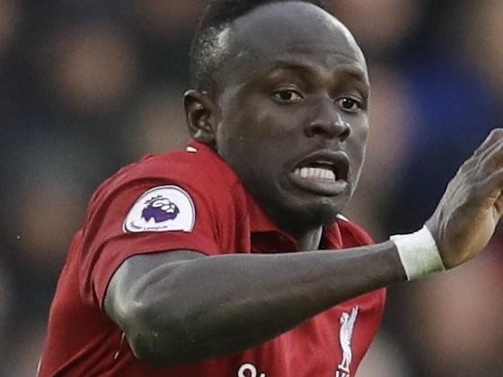 Liverpool's Sadio Mane runs with the ball during the English Premier League soccer match between Fulham and Liverpool at Craven Cottage stadium in London, Sunday, March 17, 2019. (AP Photo/Kirsty Wigglesworth)