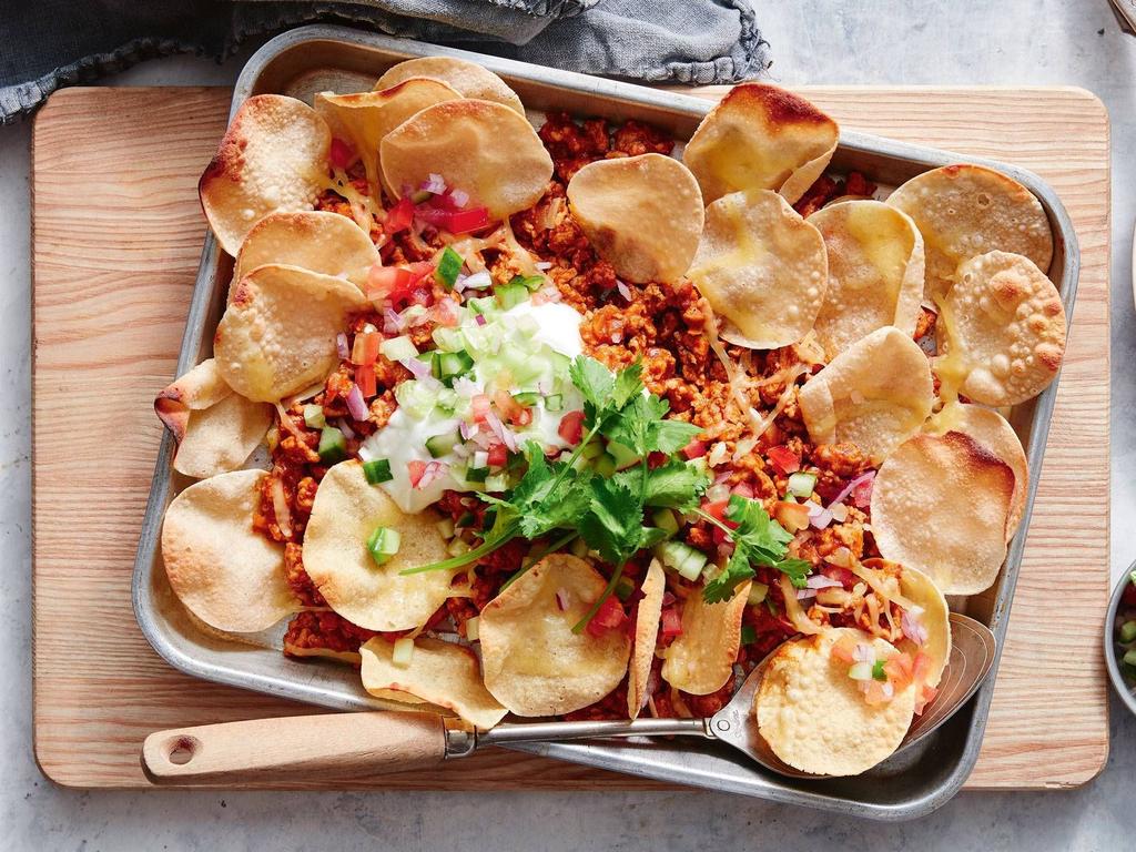 Butter chicken nachos. Picture: Supplied