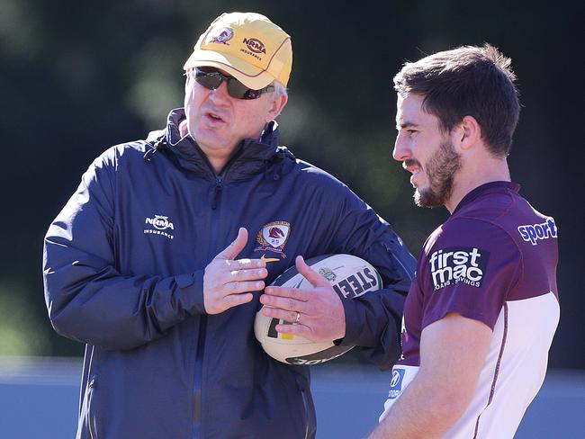 Broncos training at Red Hill. Coach Anthony Griffin with Ben Hunt. Pic Jono Searle