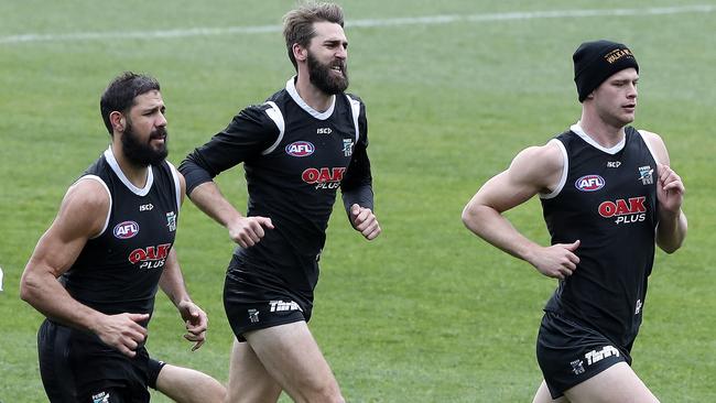 Port Adelaide’s Paddy Ryder, Justin Westhoff and Peter Ladhams at training this week. Picture: Sarah Reed