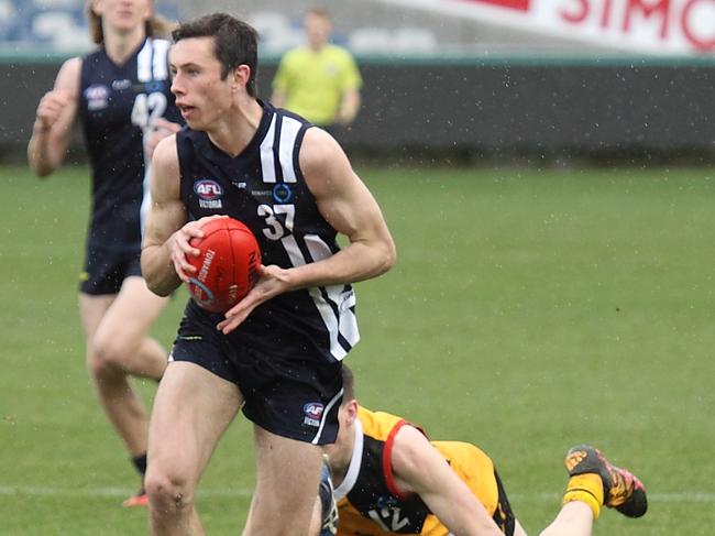 Jack Henry slips a tackle.