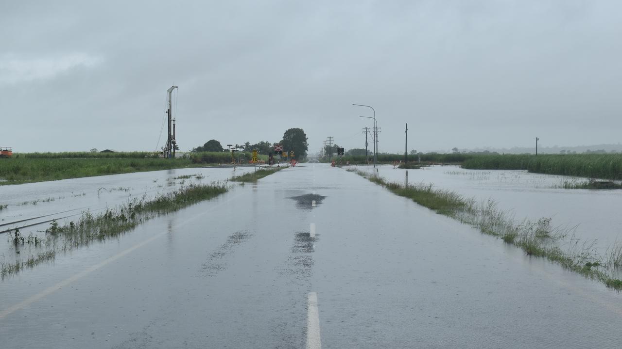 Flooded roads and cane fields alone Walkerston – Homebush Road in Mackay, Queensland. Photo: Zoe Devenport