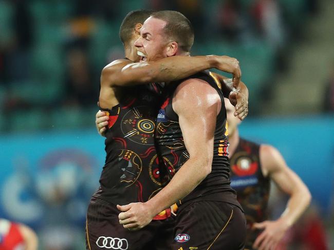 Jarryd Roughead celebrating his matchwinning goal against Sydney with teammates Shaun Burgoyne. Picture. Phil Hillyard