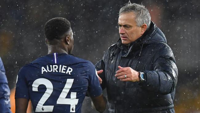 Jose Mourinho, congratulating Ivorian defender Serge Aurier, has steered Spurs to four wins from their last five starts. Picture: Paul Ellis