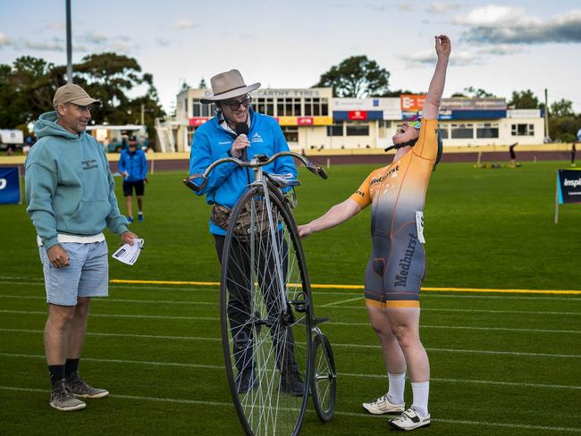 TAS Carnivals - Penny Farthing Michael Bailey Chief Commissaire Aus Cycling announcing record time to Lizanne Wilmot. Picture: Caroline Tan