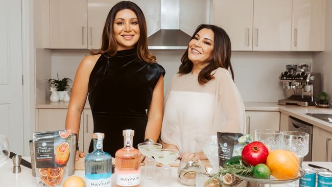 Martha and Mary Kalifatidis have partnered with Coles Liquor for a Mayfair Gin campaign. Images: supplied