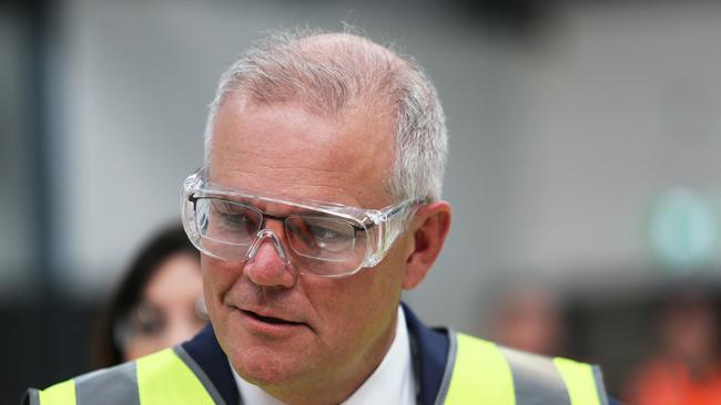 Scott Morrison tours hydrogen business Star Scientific Limited at Berkeley Vale on the NSW Central Coast on Wednesday. The Prime Minister says Australia will not ‘look to ­reduce our own emissions by shutting down our existing export industries like agriculture, ­aluminium, coal and gas’. Picture: Peter Lorimer.