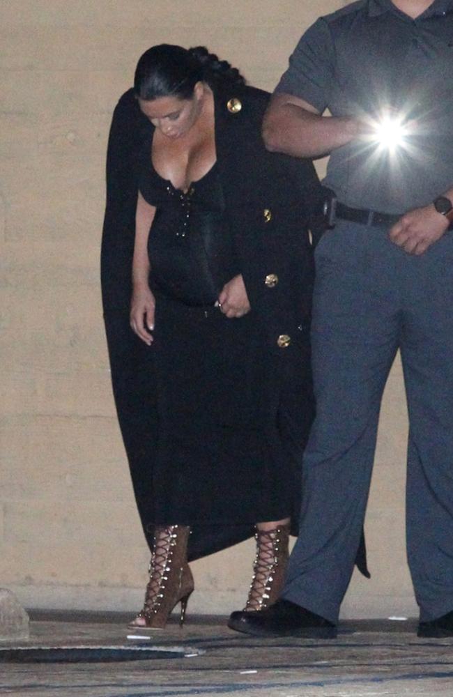 Kim Kardashian was nearly bursting out of her skin-tight maxi dress. Picture: Splash News Australia