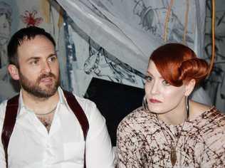 Scissor Sister female lead singer and fire-haired bombshell “Ana Matronic” with dapper rhythm guitarist and lyricist Babydaddy. Picture: Jolee Wakefield