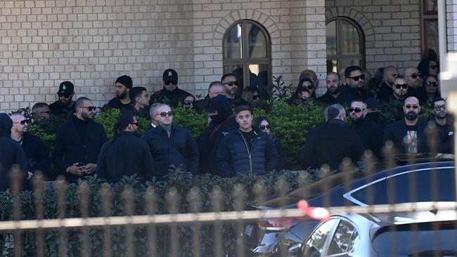 Mourners gather at the funeral of Alen Moradian at Greenfield Park on Wednesday