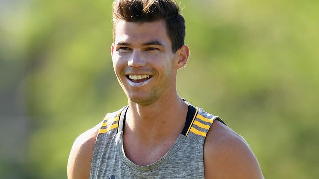 Jaeger O'Meara has a laugh at Hawthorn pre-season training.