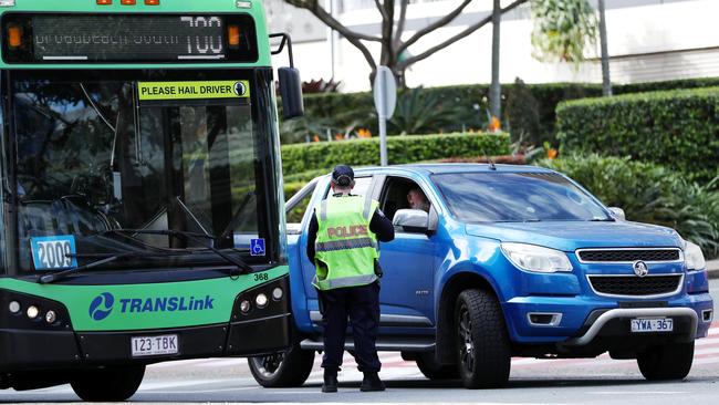 Police checking vehicles passing through the border at Coolangatta. Picture: Nigel Hallett