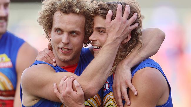 Mitch Wallis and Bailey Smith celebrate Saturday’s win over Melbourne. Picture: Michael Klein