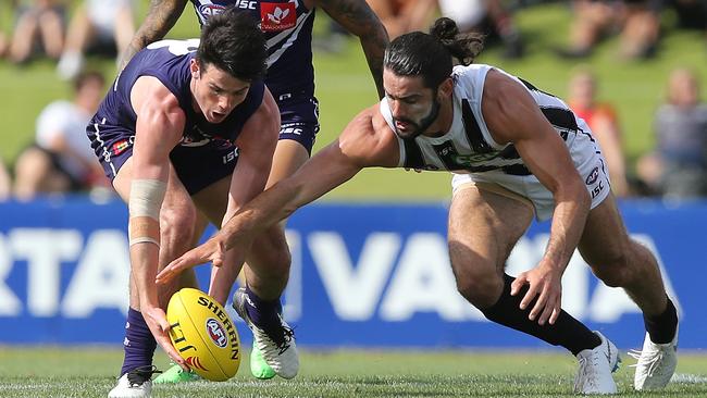 Andrew Brayshaw battles Collingwood’s Brodie Grundy for the ball last pre-season. Picture: Paul Kane/Getty