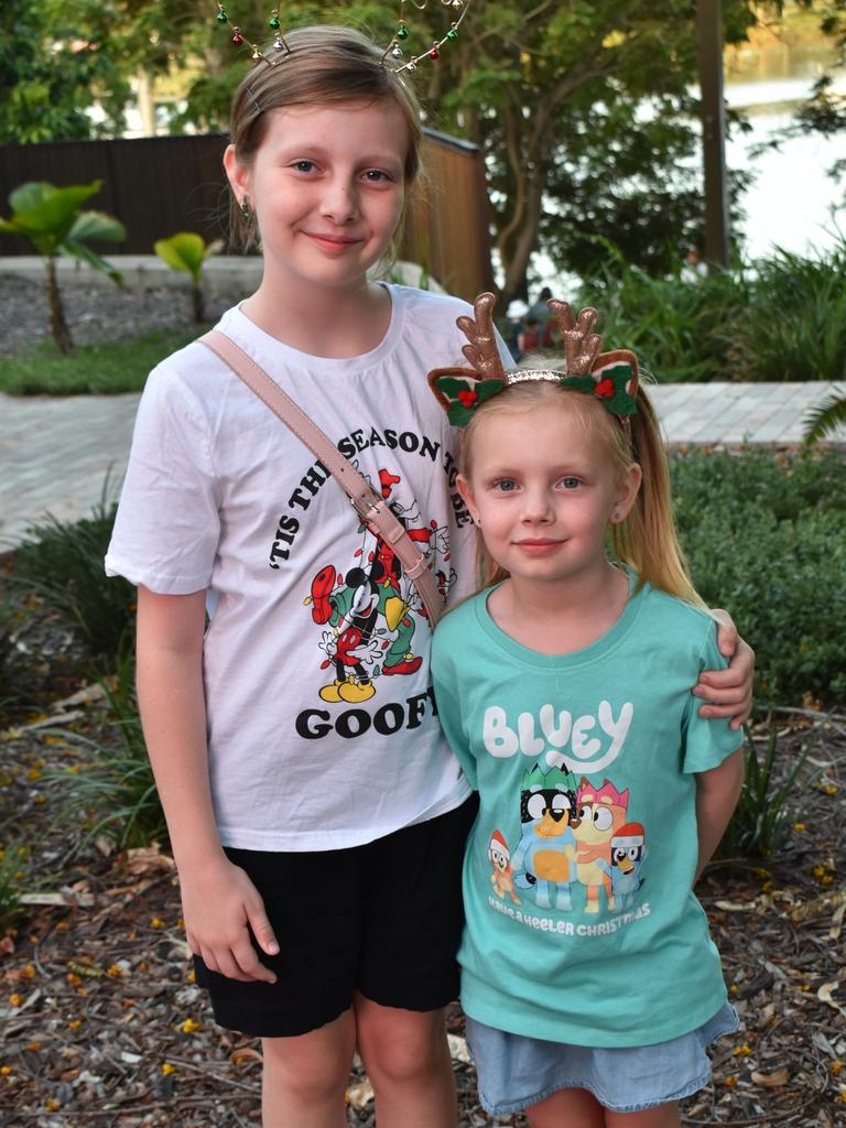 Savannah O'Rourke and Matilda Lumme at the CBD Christmas Fair in Rockhampton on December 3, 2022.