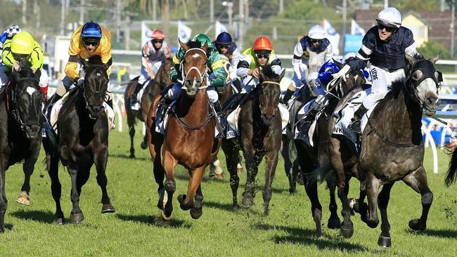 Nick Hall wins the Caulfield Cup on Fawkner (right). Picture: Wayne Ludbey