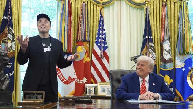 President Trump presented Elon Musk with a golden key during an Oval Office send-off on Friday. Picture: AP Photo/Evan Vucci