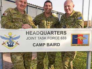 HIGH RISK: The Australian Deputy Commander Joint Task Force 633, Sgt Brad Wilson and Commander JTF633 in front of the HQ building in Dubai. Picture: CPL Sebastian Beurich