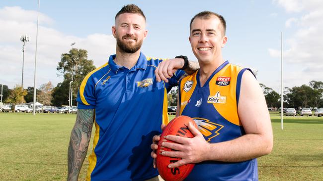 Jason Sanderson (right) with Elizabeth coach James Ramsell. Picture: AAP/ Morgan Sette