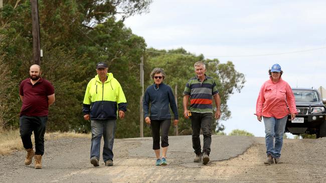 Neighbours say the one-way trial of Masons Rd has done nothing to improve safety. John Dagher, Nick Bozinovski, Tina Marshall, John Baird and Kim Filmer on the road in 2018. Picture: Stuart Milligan