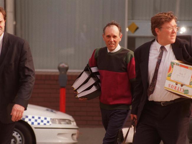 Ralph Vollmer (L) leaves the Victoria Supreme Court, appealing against a conviction for recklessly causing serious injury &amp; false imprisonment of his wife Joan.